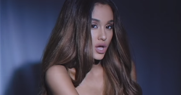 The video features Grande in a series of beauty shots, slowly flipping her hair and flirting with the camera.