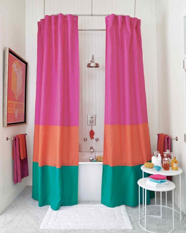 And complete the bathroom decor with some colorblock shower curtains.