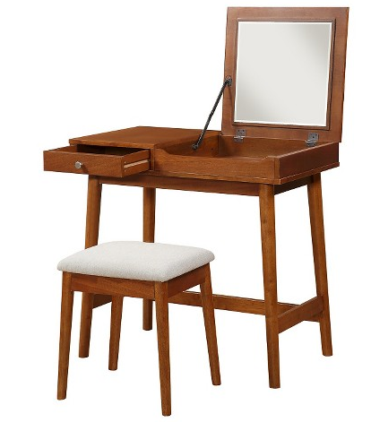 A mid-century modern desk that doubles as a mirrored vanity.