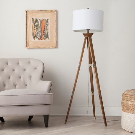 A unique tripod lamp to illuminate your space.