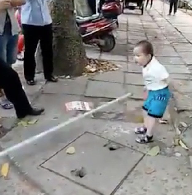The boy tenaciously screams, “Don’t touch my grandma! Go away, don’t touch my grandma!” as onlookers film and chuckle at his aggression.