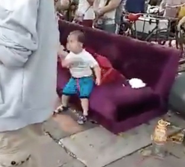 At one point, the boy is ushered to a coach by an official, but quickly fends him off with arm strikes.