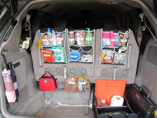 Hang over-the-door organizers in your trunk to create a fully stocked car command center.