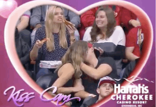 This Woman Stuffing Her Face With Pizza On Kiss Cam Is The Hero We Need