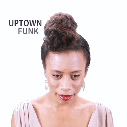 *Starting at front, behind your ears, take diagonal sections and brush up and forward to create an off-center oval shape that starts at your forehead and ends slightly behind the crown of your head.*Secure sections with bobby pins inward. Pins on opposing sides are about 2-3 inches apart. *Continue brushing sections up and forward with a soft boar bristle brush.*Grab the last section from the nape of your neck and brush upwards. *Finish by fluffing and refining curls on top to create desired shape and volume.