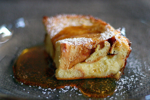 This baked french toast can be made ahead of time. Just pop it in the oven when you wake up, and by the time you're fully awake it will be ready to eat.
