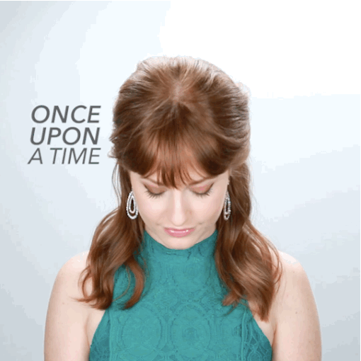 Start by curling hair with a one-inch curling iron leaving the ends out to give it a wavy texture. Backcomb the top and sides, and lightly spray with hairspray. Smooth out and pin one side into the middle-back of the head, then grab the other side and pin it into the back.