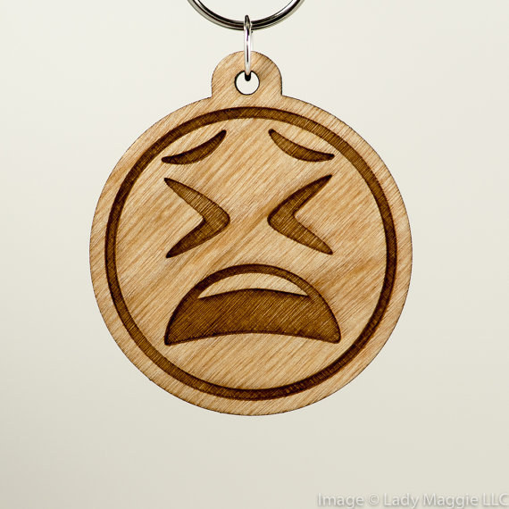 This tired face emoji necklace, because it you.