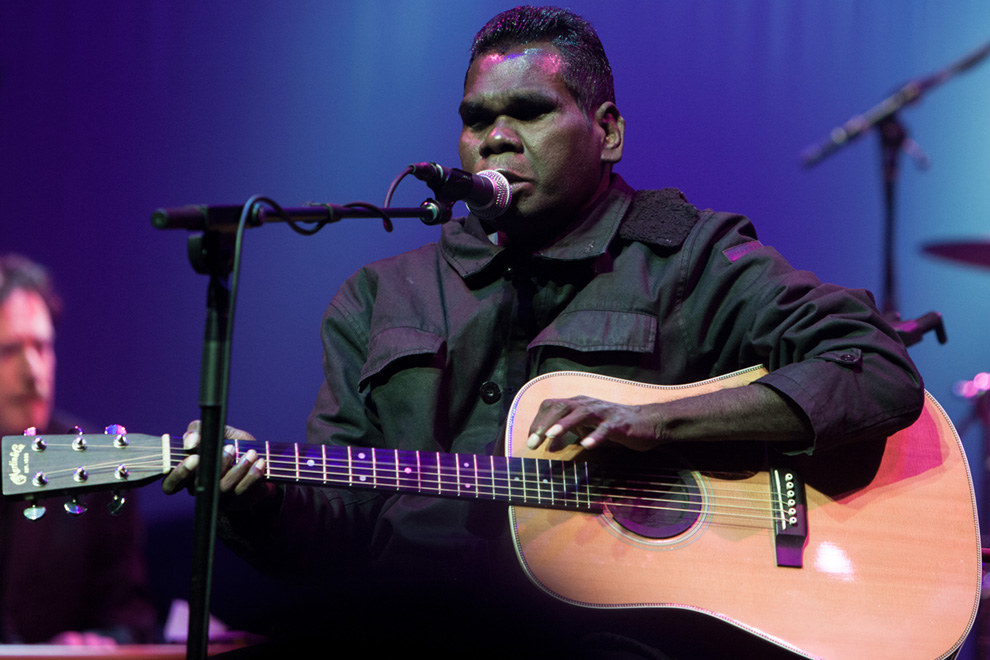 "He was admitted on easter Sunday at about nine o'clock, into A&E at RDH and was then sent to the rapid assessment department, which basically is the place you go if urgent action is needed once A&E assess you," Yunupingu's manager Mark Grose told Channel 9 News. "He got there about 1am in the morning and was not operated on until 10 or 11 the next morning. He was essentially internally bleeding for a good eight plus hours". Grose believes that staff had racially profiled the Yolgnu man, who lives with Hepatitis B, as an alcoholic. Grose has now sent an angry letter to the hospital questioning why Yunupingu wasn't treated until he was on the verge of death. "There are two assumptions that I can make which are both very disturbing but need answering. Was Gurrumul Yununpingu's level of A&E care related to assumptions based on his race or is there a serious fault in the system that allows someone to be largely ignored by A&E while seriously ill?," Grose wrote in the letter.