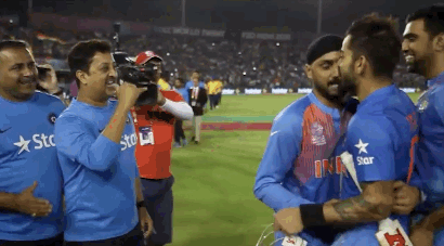 Harbhajan Singh insisting on carrying a reluctant Virat Kohli for a very awkward victory lap.