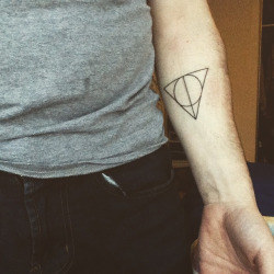 A tribute tattoo to something you love, whether it'a a band, movie, or anything else!