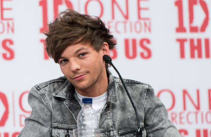 Louis Tomlinson throws baby doll off stage in video after Briana