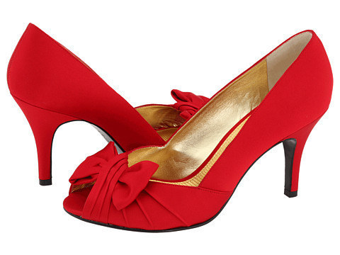 Peep-toe heels topped with a sweet bow.