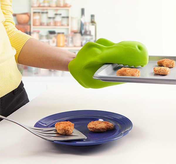 An oven mitt that turns your hand into a dinosaur.