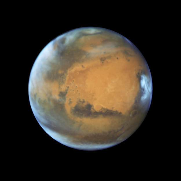 Mars will be glowing its brightest in two years on Sunday night during a phenomenon called Mars opposition.