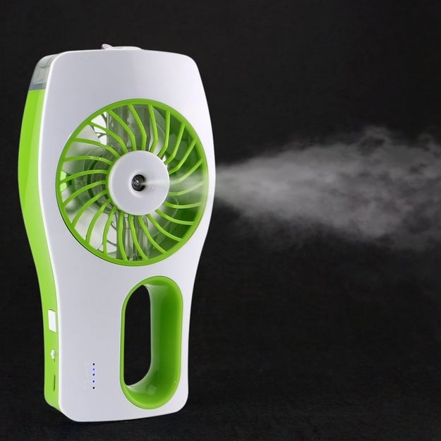 A handheld fan that charges via USB and spritzes you with water.