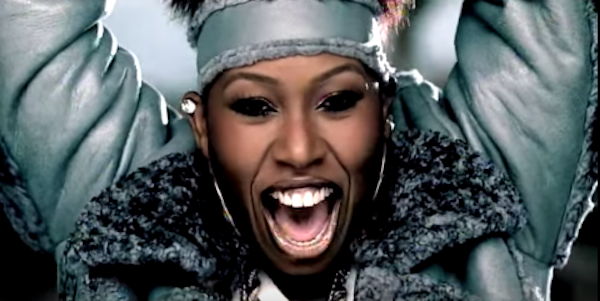 Missy Elliott's gray coat, headband, and cartilage earring from "Work It"