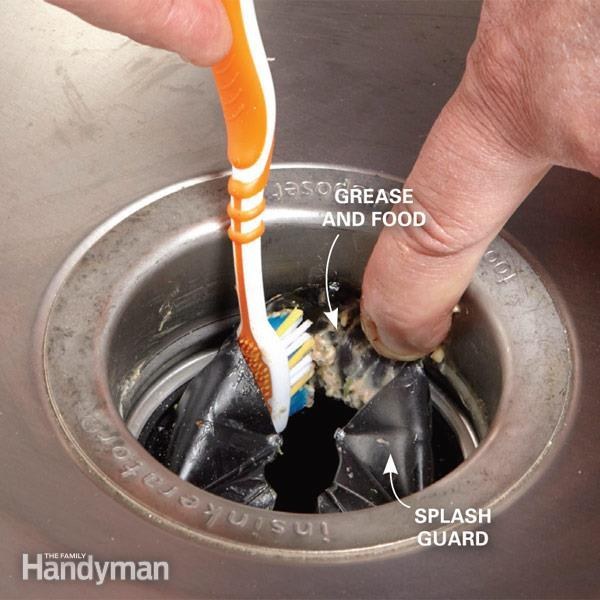 If you have a garbage disposal, clean it out with an old toothbrush, making sure to get underneath the splash guard.
