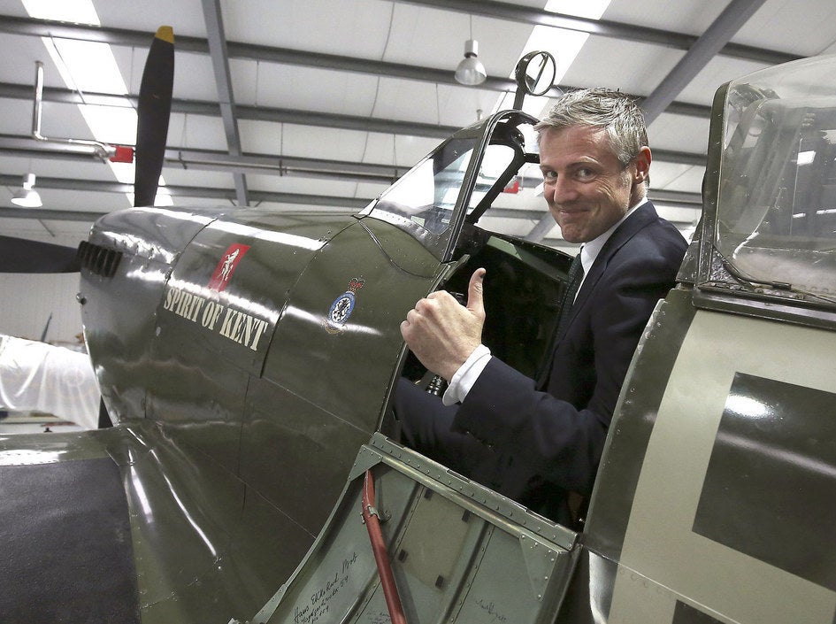 Conservative candidate for London Mayor Zac Goldsmith sits in a Spitfire plane during a tour of Biggin Hill Heritage Hangar in south east London.