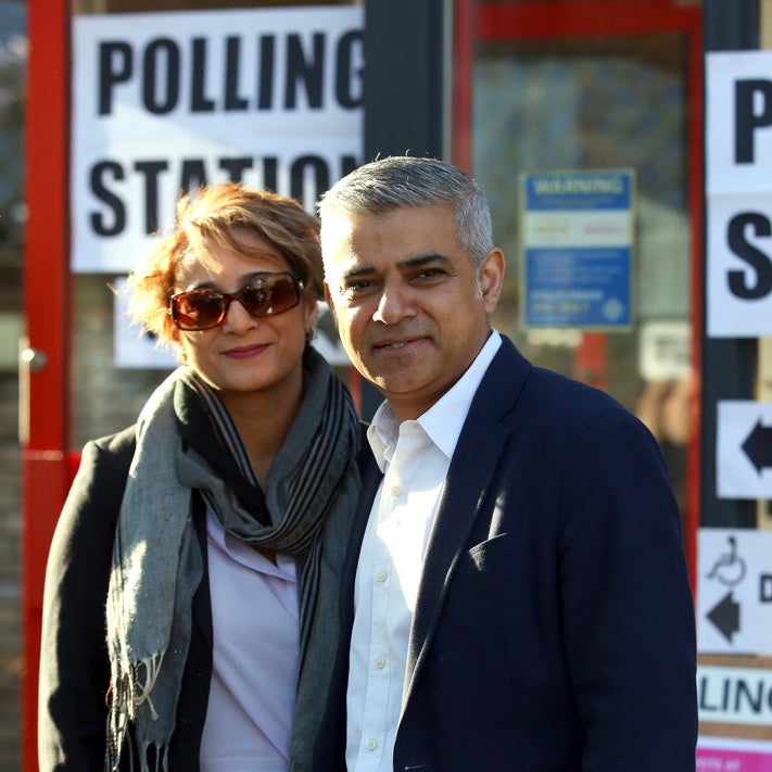 Labour candidate Sadiq Khan and his wife Saadiya after casting their votes in Streatham.