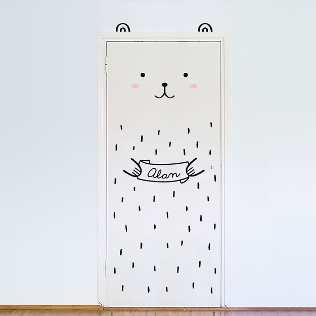 A customizable bear to stick to a door.