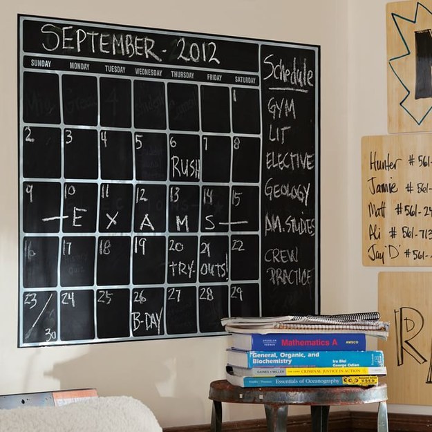 A chalkboard calendar for planning out the school week.