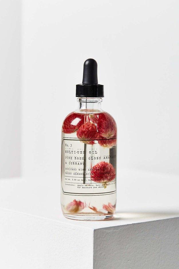 This pretty petal-infused multi-use oil with REAL FLOWERS IN IT.