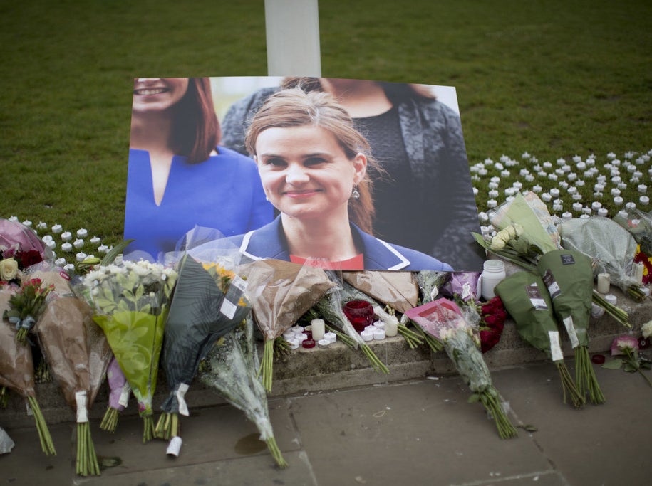 Tributes for Jo Cox outside the House of Parliament in London, Friday, June 17.