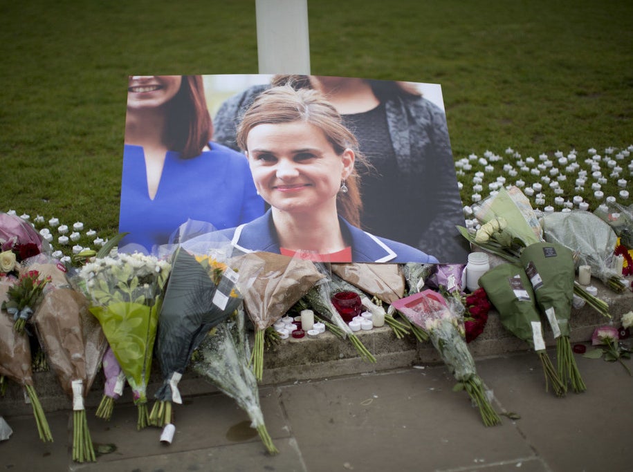 Tributes for Jo Cox outside the House of Parliament in London, Friday, June 17.