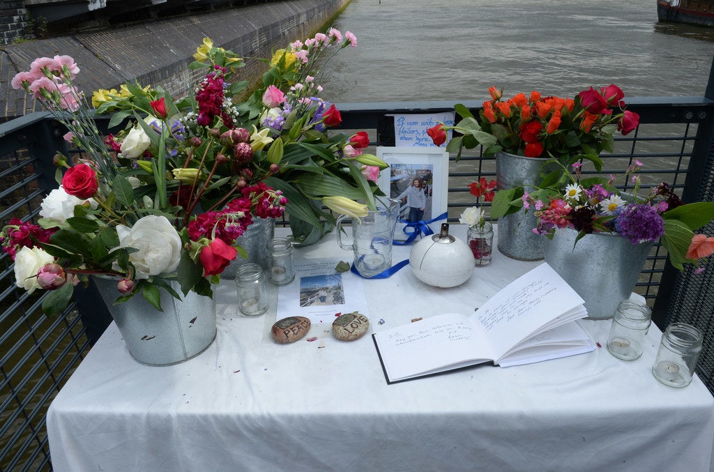 A book of condolences set up at the site where the Cox family&#x27;s houseboat is moored.