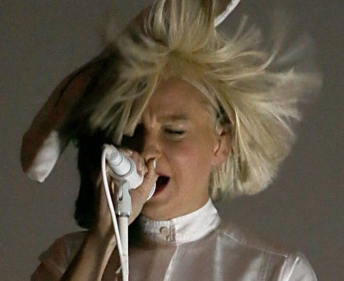 Sia Reveals Her Face After Wind Blows Her Wig