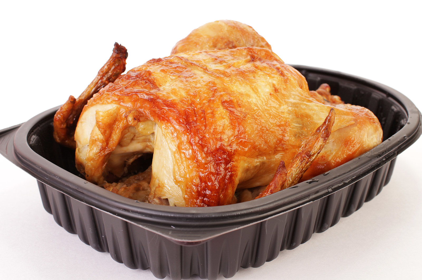 Here's Why You Should Buy A Grocery Store Rotisserie Chicken