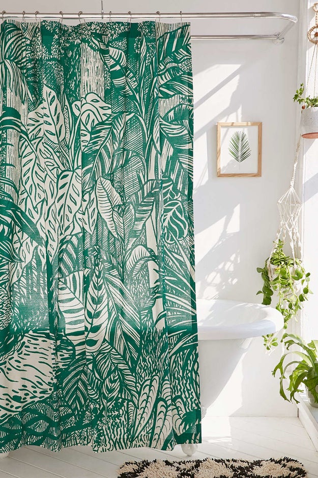 This shower curtain that brings in a rainforest.