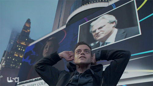 Fsociety's plan to wipe out the majority of people's debt worked. The economy is on the brink of collapse, people are marching in the streets, and a man shot himself in the head on live television. Where do we go from here?