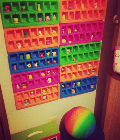 Use Scotch indoor mounting tape to affix the trays to the wall. This cool idea comes via thegrantgirl.