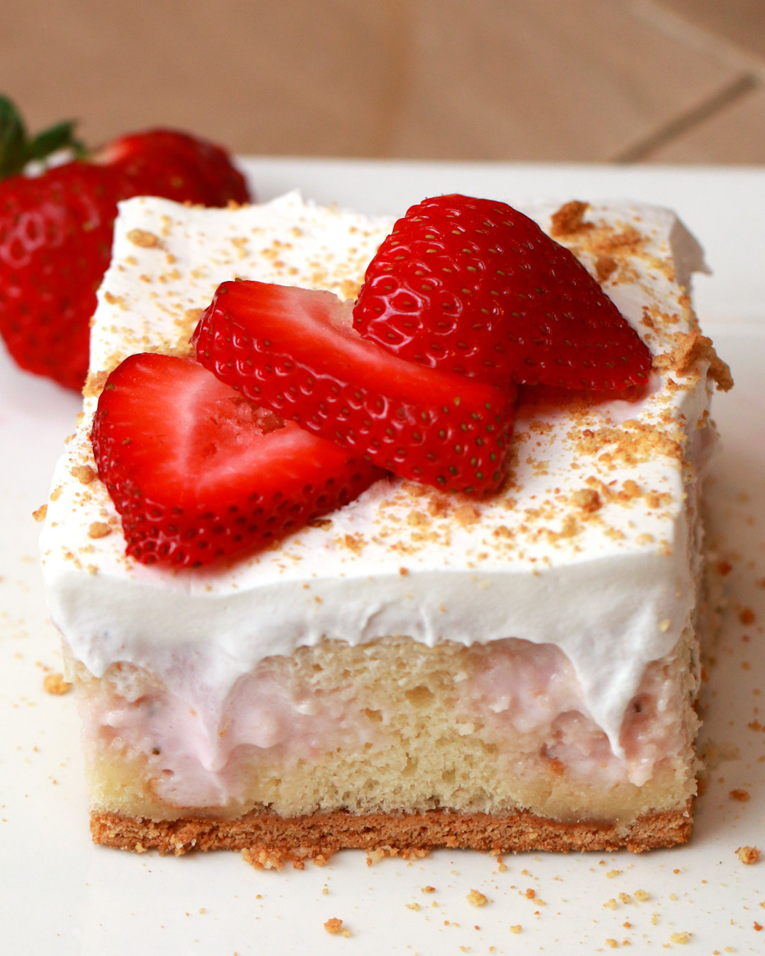 This Strawberry Cheesecake Poke Cake Is Basically Magic