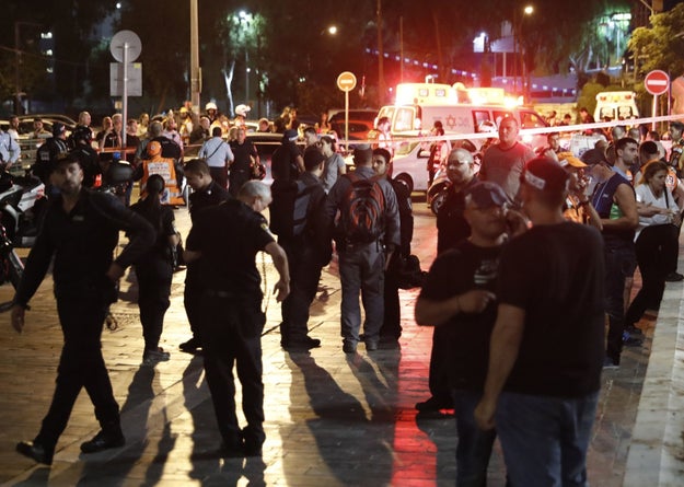 At least four people were killed and several others injured when gunmen opened fire at a popular outdoor market in Tel Aviv on Wednesday night, police said.