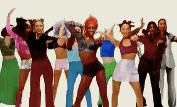 GIF of women dancing the Macarena in the music video
