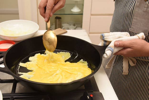 According to Talde, “if you put eggs in a pan first, nothing will stick to the pan [afterwards as you cook]." We skeptically asked him why this was true. “I dunno, man. I’ve been working in Chinese restaurants for how long, and every time you make fried rice it’s like, 'Start with egg, or else it’s gonna stick.' And I’m like, ‘Yeah, bullshit.' So then I didn’t do it one time and I’m like, ‘WHAT THE FUCK?!’ All the rice stuck to the fuckin’ wok.”Here's exactly how Talde makes fried rice.
