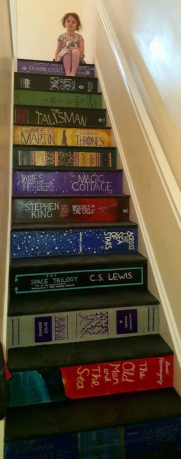 This Woman Painted Her Staircase To Look Like Books And OMG It s Branham painted 13 stairs to look like her and her husband Jonathan s favorite books and the finished product is incredible