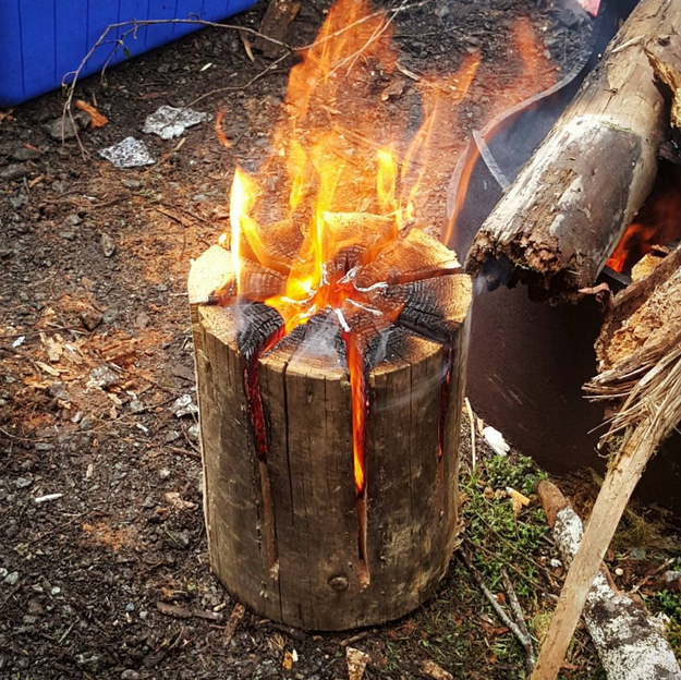 For your campfire, try the Swedish torch method: No need for extra pot supports + it looks cool.