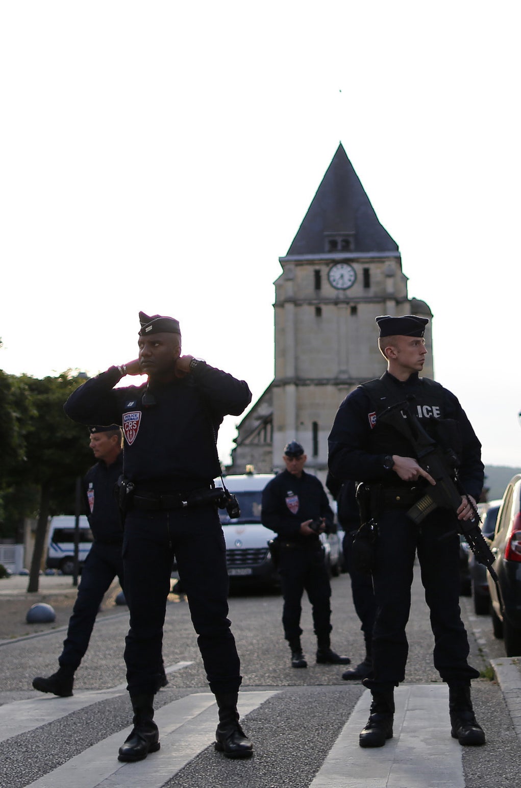 Police outside the church in Saint-Etienne-du-Rouvray