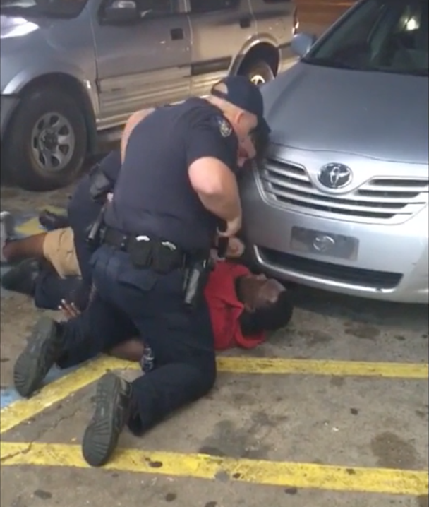 New video released Wednesday showed Baton Rouge police appear to remove a gun from Alton Sterling's pocket after shooting the man multiple times as he lay on his back.