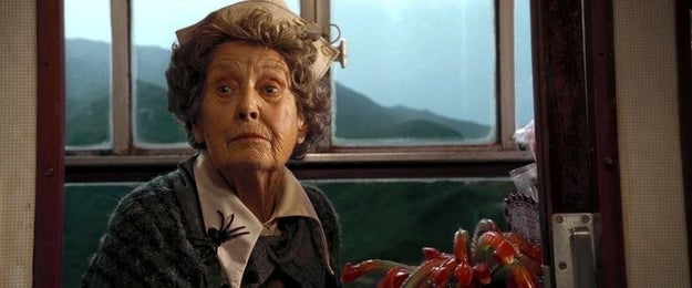 THE TROLLEY WITCH FOLLOWS THEM. She's just pushing her cart all casual, on the roof of a speeding train. "Anything from the trolley, dears? Pumpkin Pasty? Chocolate Frog? Cauldron Cake?" she says. "Oh," says Albus Severus.