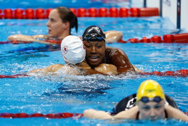 And hugs and smiles again when hugging her co-gold medalist. AND IT FELT LIKE ANYTHING IS POSSIBLE!