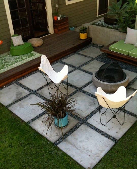 There isn&#x27;t a tutorial for this, but you can see more photos of this space here. To pull it off, you&#x27;d buy several 20x20&quot; patio stones (like these, $6.58 each) and lay them out. Then fill in the gaps with rocks like these, $28.33 for 20 pounds.