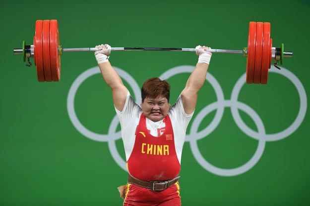 They look like Meng Suping, gold medalist in women's weightlifting.