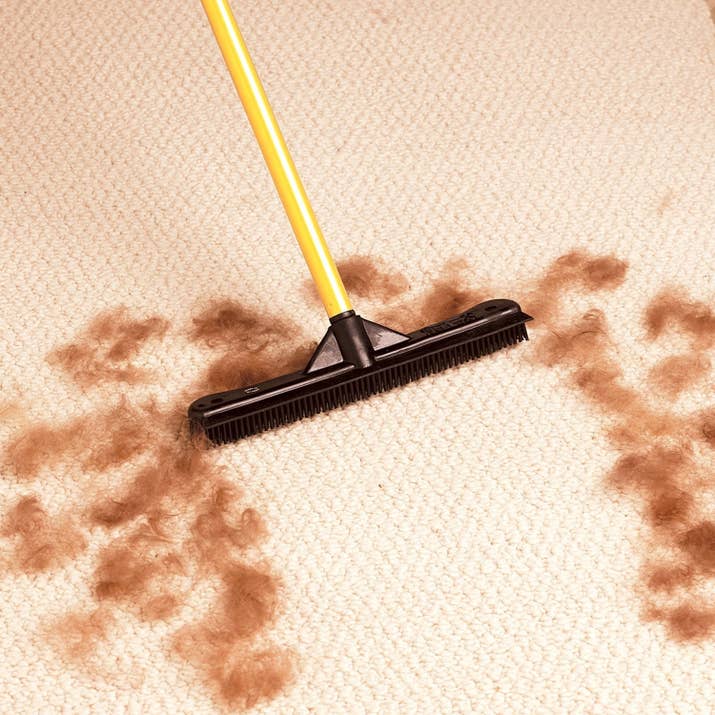 "I have two long-haired cats who shed EVERYWHERE. I bought this strange rake for my rug and couch to brush the hair off, and it works! It was only $16 or so, and I absolutely love it." —Maddie Nessel, FacebookPrice: $16
