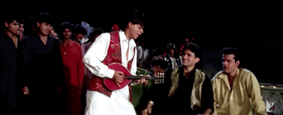 You know damn well you have no idea WTF you're doing with that mandolin, Shah Rukh.