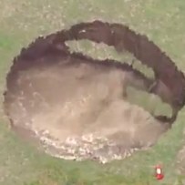 Giant Sinkhole Rips Open Backyard, Conveniently Leaves Behind Frothy ...